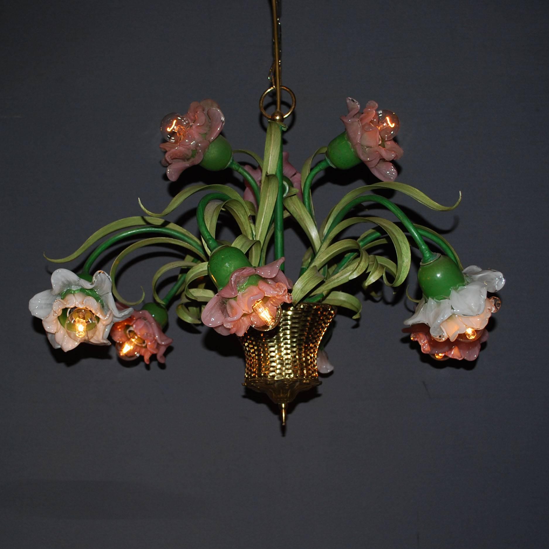 20th century chandelier depicting flowers in a basket.
Flowers are made from hand-painted glass, basket is made from copper.
Nine lights.
Originates France, dating circa 1960.
