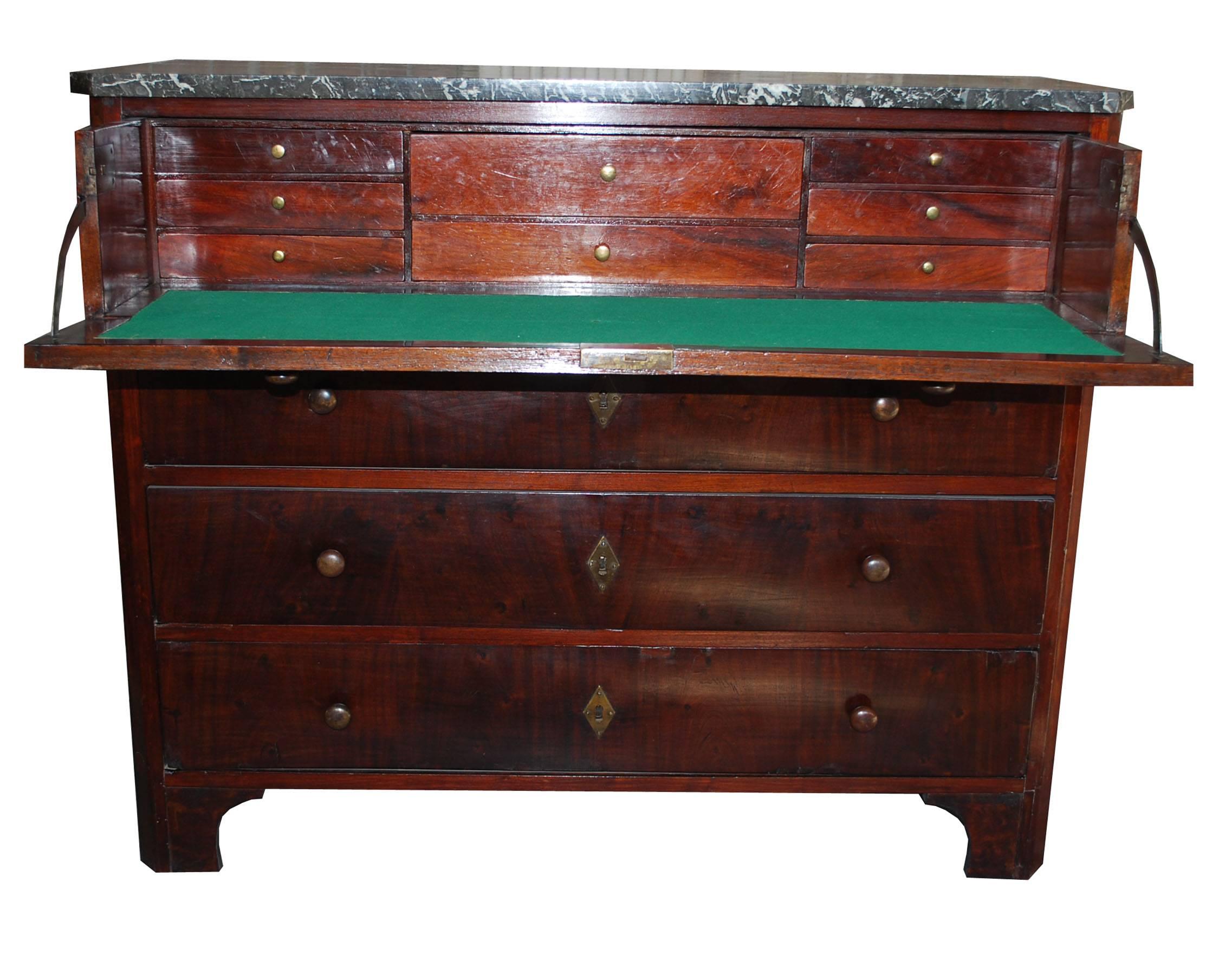 19th century mahogany veneer on oakwood secretaire or chest of drawers with secretary/writing drawer.
Marble top.
Originates Holland, dating, circa 1830.
(Shipping cost on request, depends on destination).