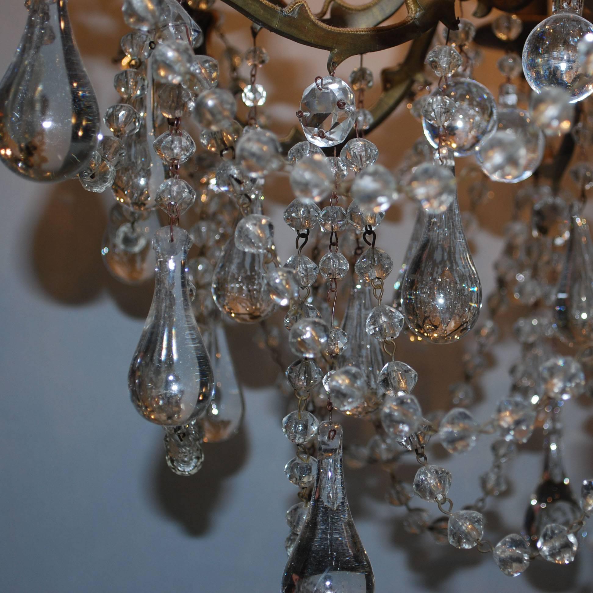 Beautiful chandelier, bronze frame hung with drop shaped and round crystal.
Originates France, dating circa 1870.
(Shipping costs on request, depends on destination).