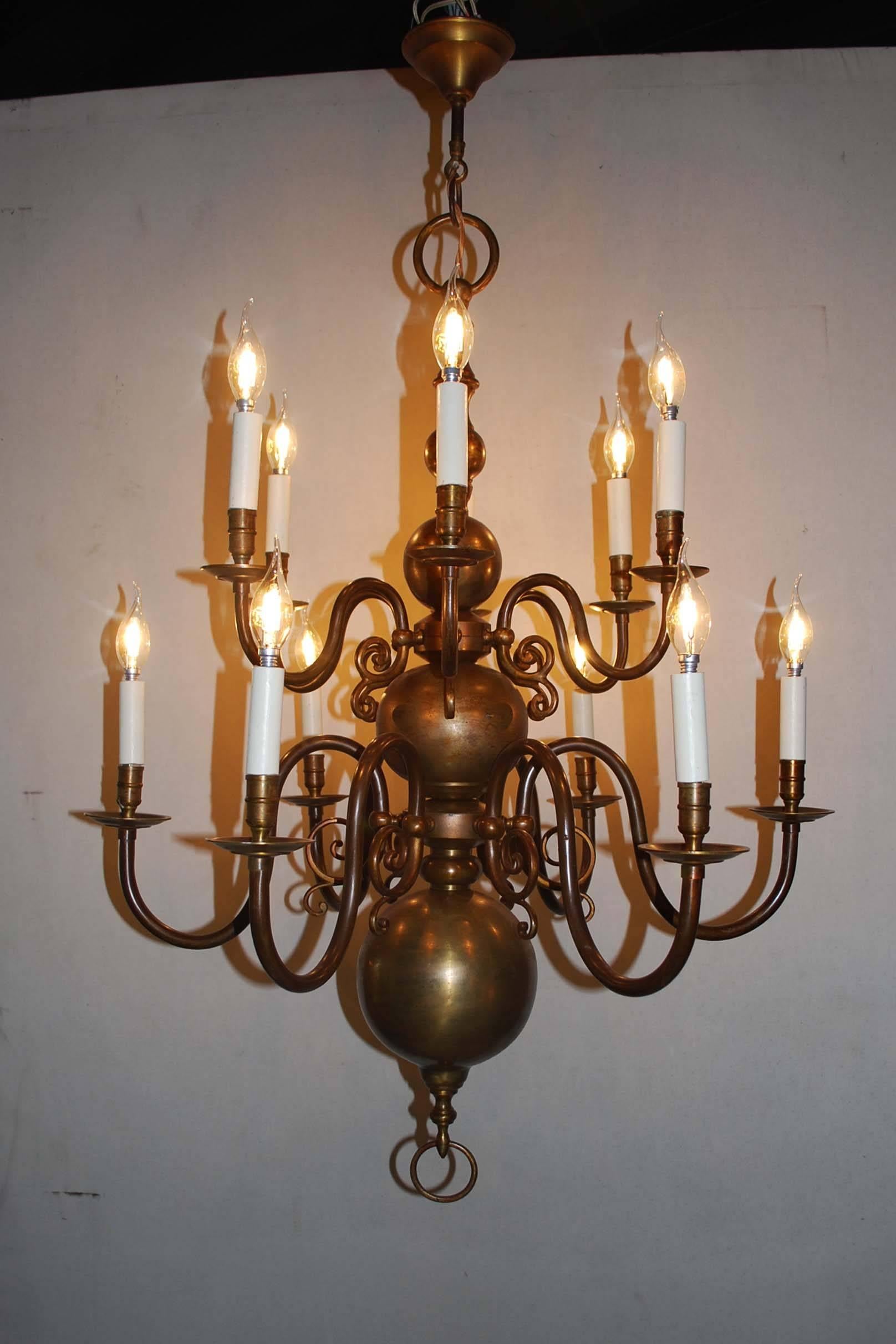 Pair of 20th century brass chandeliers.
Each chandelier has 12 lights.
Originates Holland, dating circa 1920.
(Shipping costs on request, depends on destination).