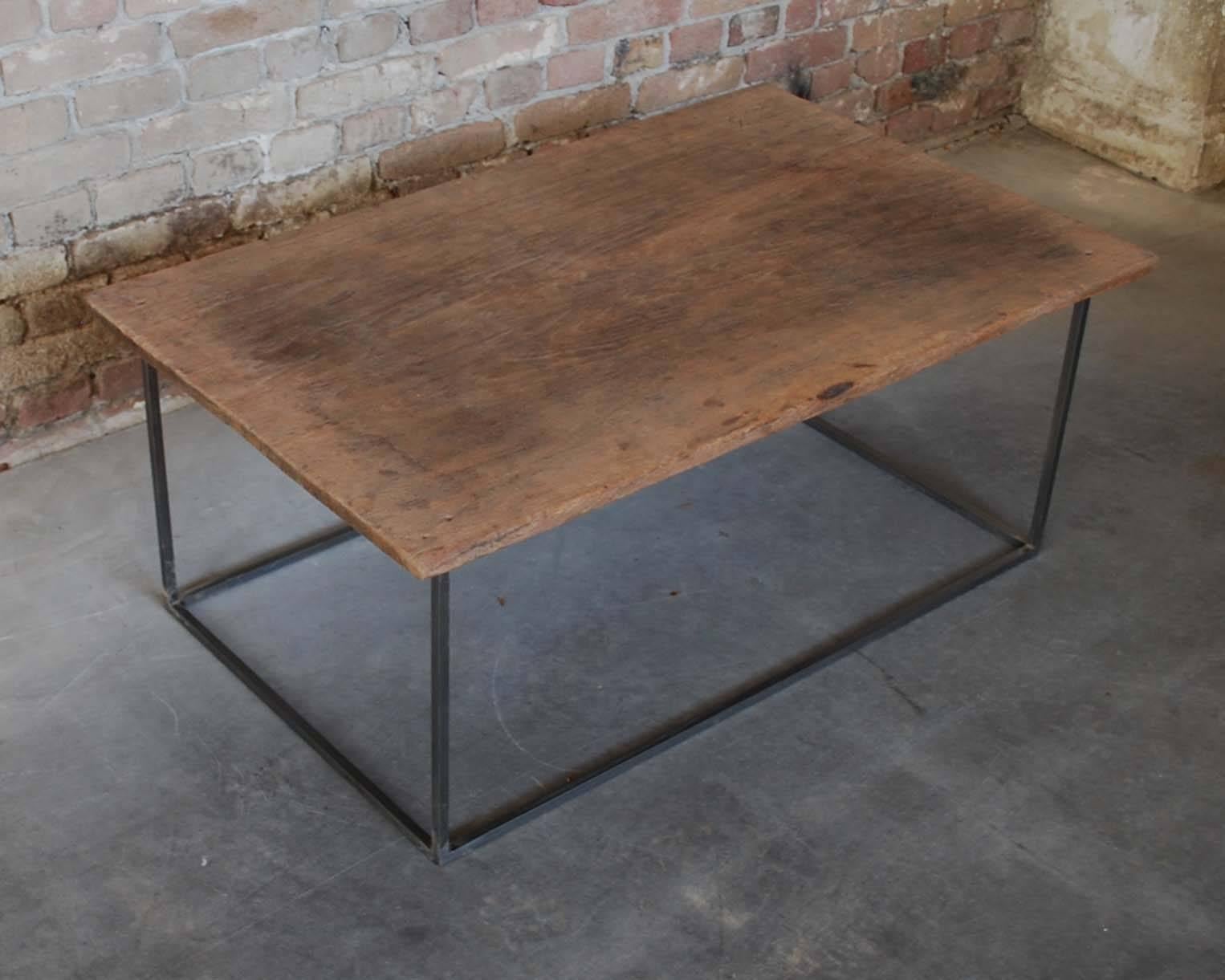 Contemporary coffee table.
Top made from one piece of teak wood, top dating, 1900.
Steel frame.
Originates the Netherlands, dating 2015.
(Shipping costs on request, depends on destination).
     