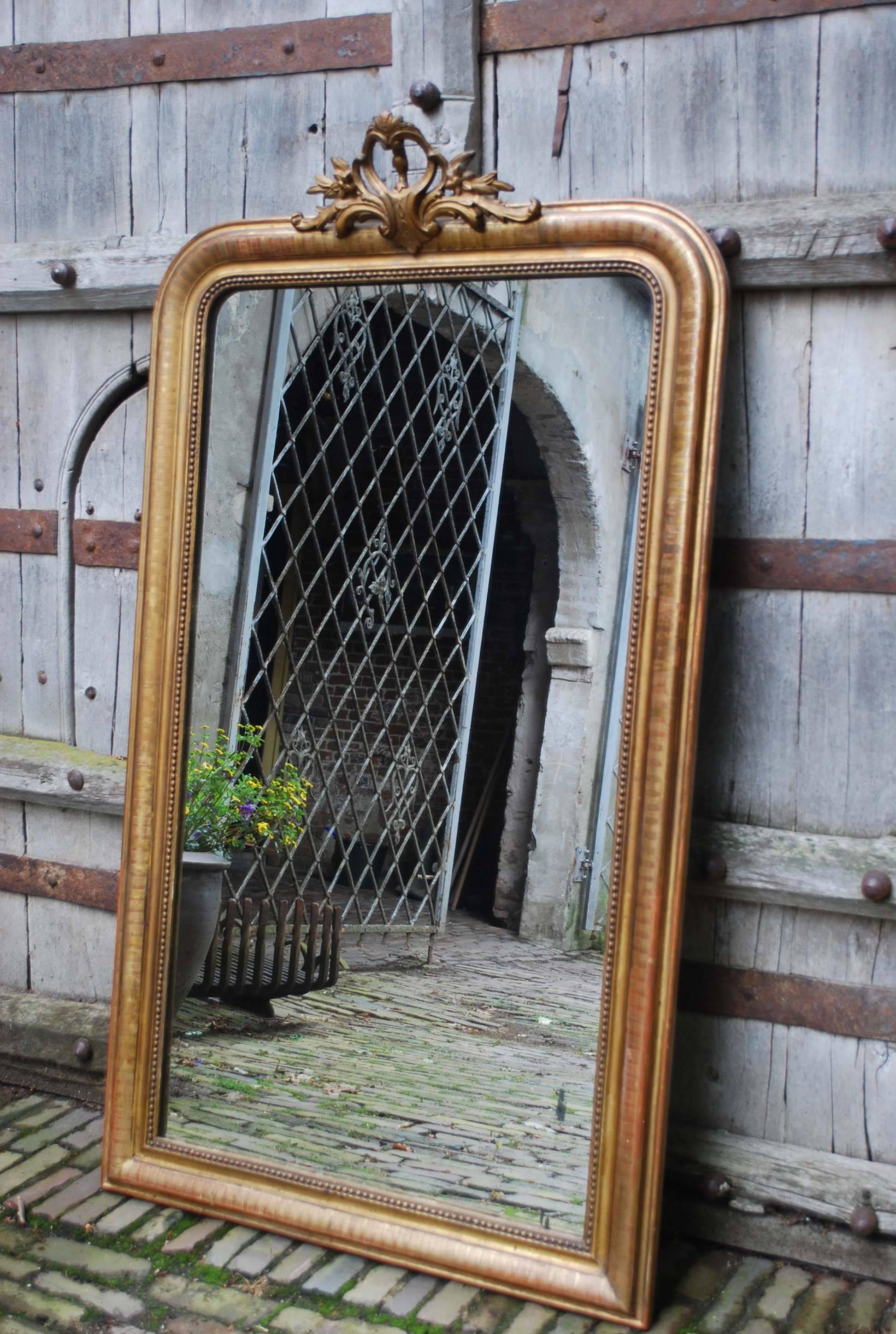 19th century gold gilded baroque mirror. 
Originates France, dating circa 1880. 
(Shipping costs on request, depends on destination).