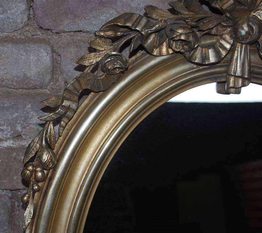 French Pair of 19th Century Silver Gilded Oval Mirrors