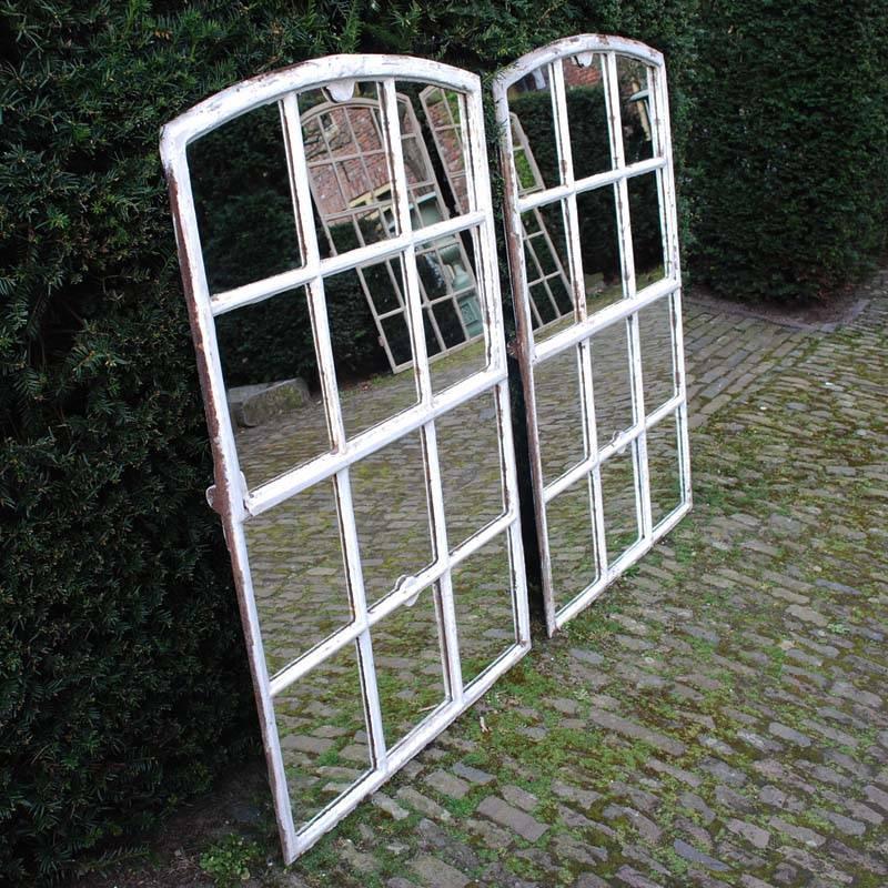 Industrial cast iron window frames with new mirror glass.
Excellent for restoring an old (farm) house or as Industrial mirrors.
Originates France, dating circa 1880.