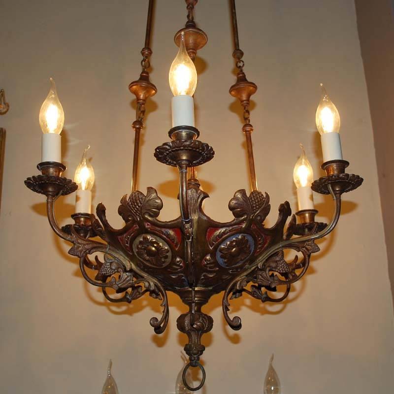 Pair of 19th century brass chandeliers.
Each chandelier has six lights and new electric wiring.
Beautiful colored details on the lower part of the chandelier.