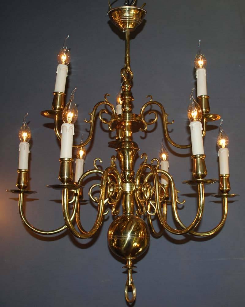 20th century brass chandelier.
This chandelier has nine lights.
Originates in the Netherlands, dating app. 1920.