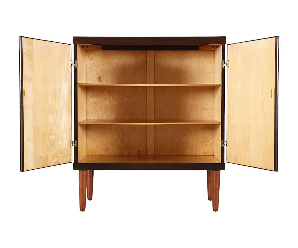 Designer: Hans Olsen
Manufacturer: Hans Olsen Studio
Period/style: Danish modern
Country: Denmark
Date: 1950s

Dimensions: 38.5 H x 33.5 W x 16.5 D
Materials: Teak wood, brass hardware
Condition: Excellent, newly refinished
Number of items: