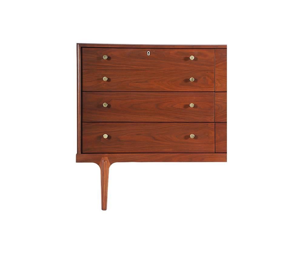 Manufacturer: Drexel “Apart Mates”
Period/style: Mid-Century Modern
Country: United States
Date: 1950s

Dimensions: 32.25? H x 54? L x 19? W
Materials: Walnut wood, brass
Condition: Excellent, newly refinished
Number of items: One
ID