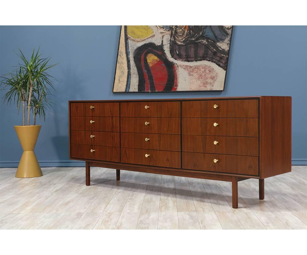 Manufacturer: Glenn of California
Period/Style: Mid-Century Modern
Country: United States
Date: 1950’s

Dimensions: 30.5?H x 77.5?W x 18?D
Materials: Walnut wood, brass handles
Condition: Excellent – newly refinished
Number of items: One
ID