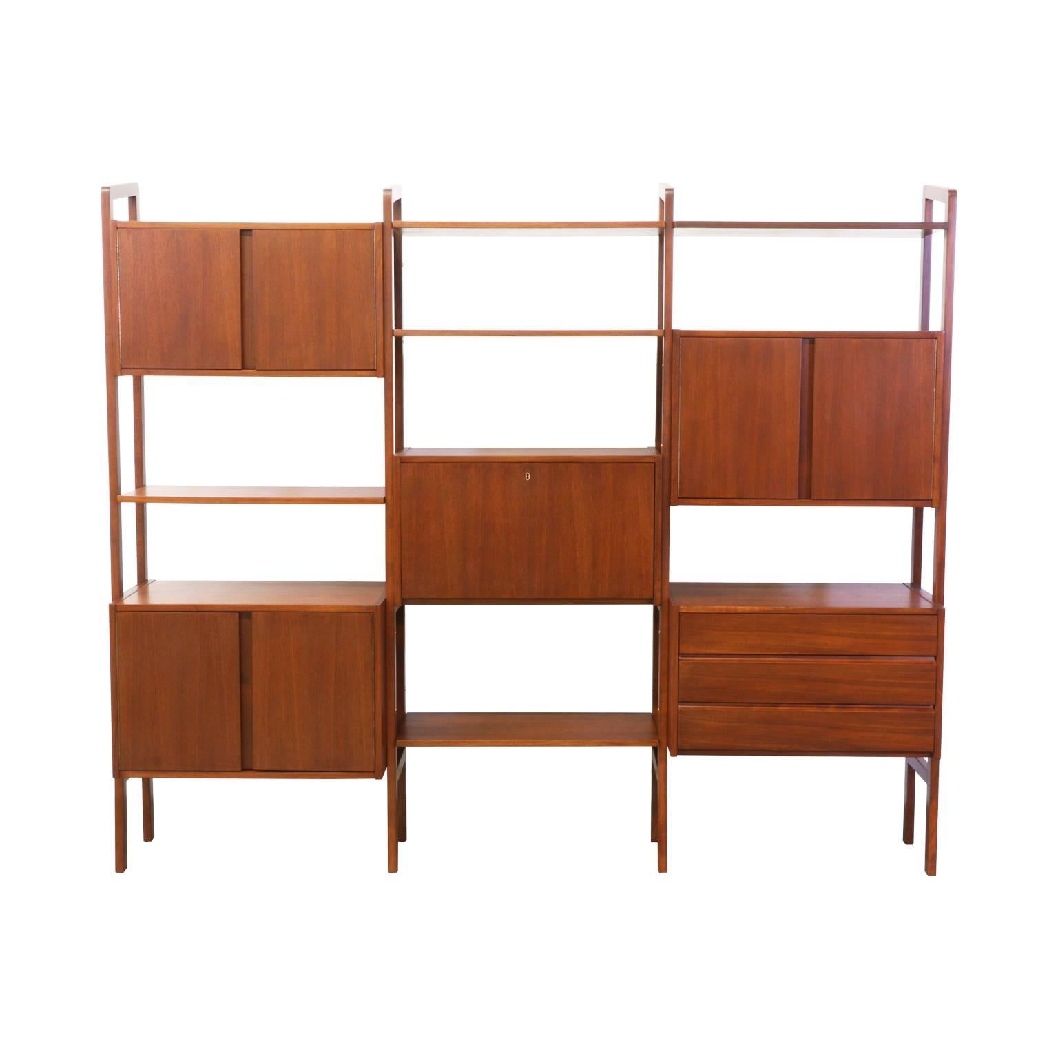 Designer: Unknown
Manufacturer: Unknown
Period/Style: Mid Century Modern
Country: United States
Date: 1950’s

Dimensions: 71″H x 86.5″L x 16.5″W
Materials: Walnut
Condition: Excellent – Newly Refinished
Number of Items: 1
ID Number: 1559