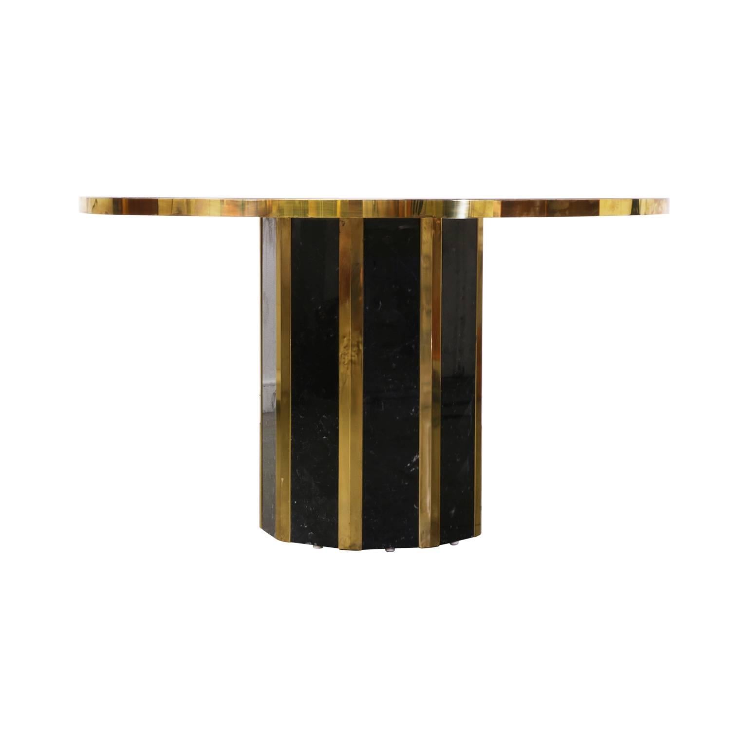 Designer: Unknown
Manufacturer: Unknown
Period/Style: Mid Century Modern
Country: United States
Date: 1970’s

Dimensions: 29″H x 50.5″W
Materials: Brass, Black Marble
Condition: Shows wear from age and use
Number of Items: 1
ID Number: 3300