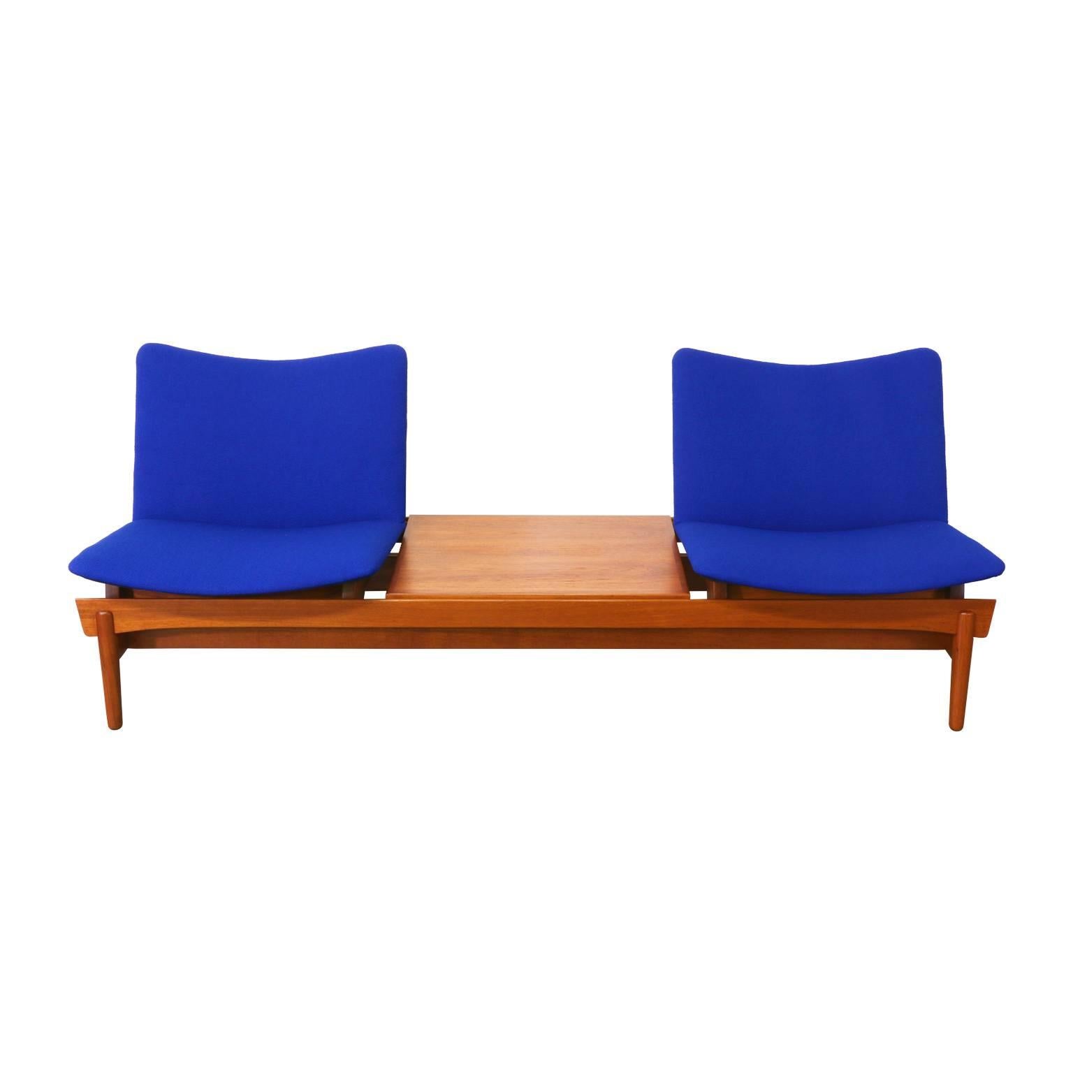 Designer: Hans Olsen.
Manufacturer: Bramin.
Period/Style: Danish modern.
Country: Denmark.
Date: 1950s.

Dimensions: 28″ H x 67″ L x 30″ W.
Materials: Teak, tweed fabric.
Condition: Excellent, newly refinished and reupholstered.
Number of