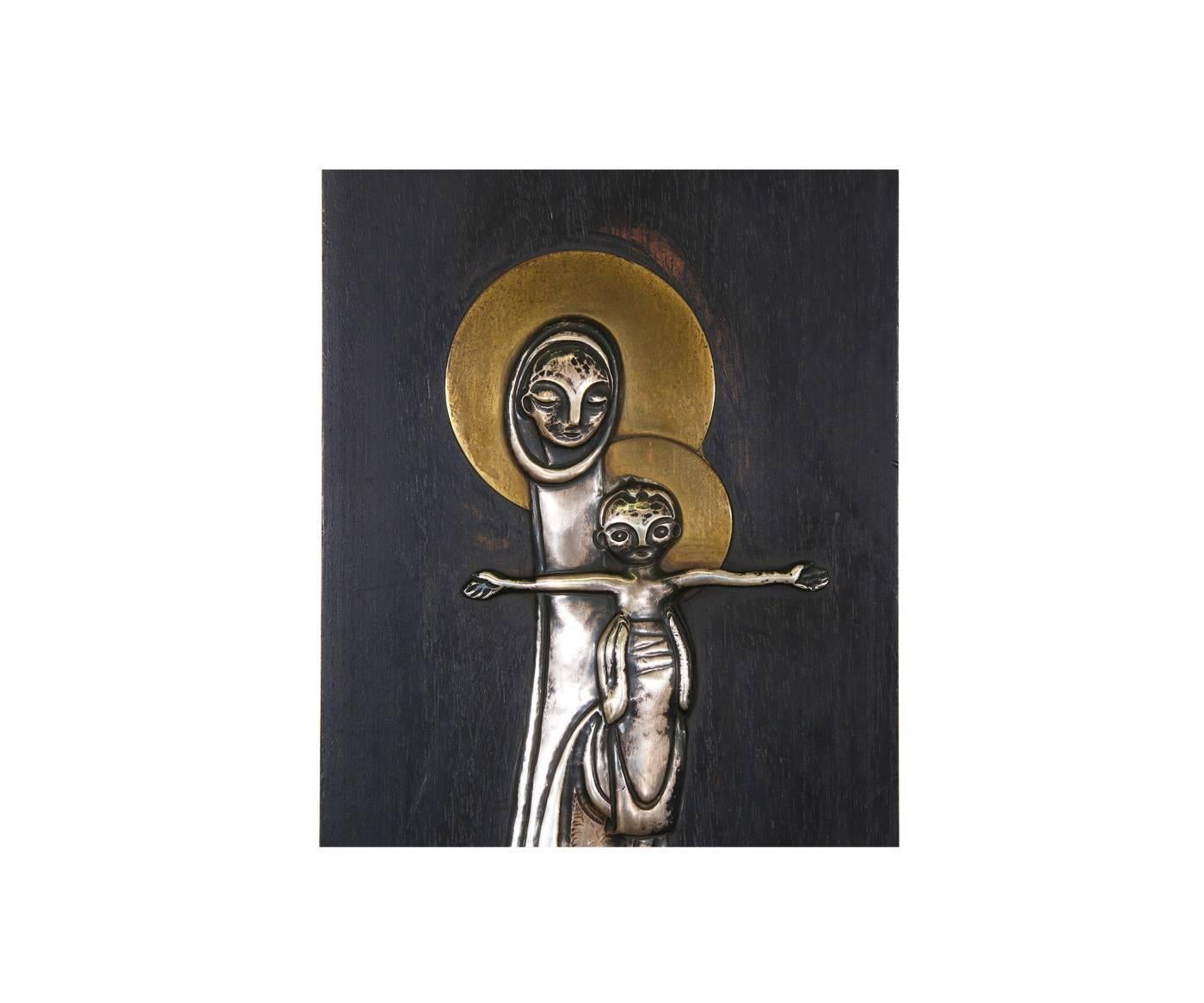 Designer: Benedictine Monks of Cuernavaca
Manufacturer: Talleres Monasticos
Period/Style: Mexican Modernism
Country: Mexico
Date: 1960’s

Dimensions: 18″H x 6″W
Materials: Brass, Sterling Silver, Wood
Condition: Wear consistent with