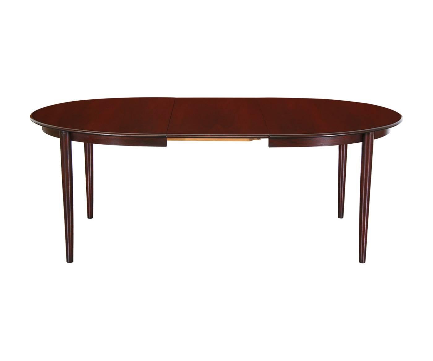 Designer: Unknown
Manufacturer: Unknown
Period/Style: Danish Modern
Country: Denmark
Date: 1960’s

Dimensions: 28.25″H x 59″L x 41.25″W
Extension Leaf 19.75″
Materials: Rosewood
Condition: Excellent – Newly Refinished
Number of Items:
