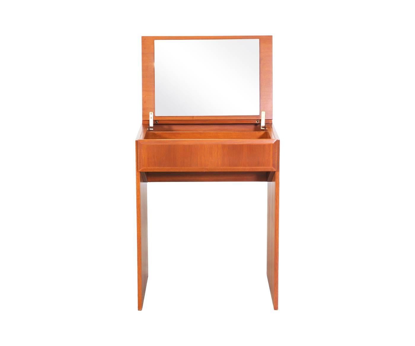 Designer: Unknown
Manufacturer: Unknown
Period/Style: Danish Modern
Country: Denmark
Date: 1950’s

Dimensions: 29.5″H x 23″W x 17.75″D
Materials: Teak, Mirror
Condition: Excellent – Newly Refinished
Number of Items: 1
ID Number: 4239