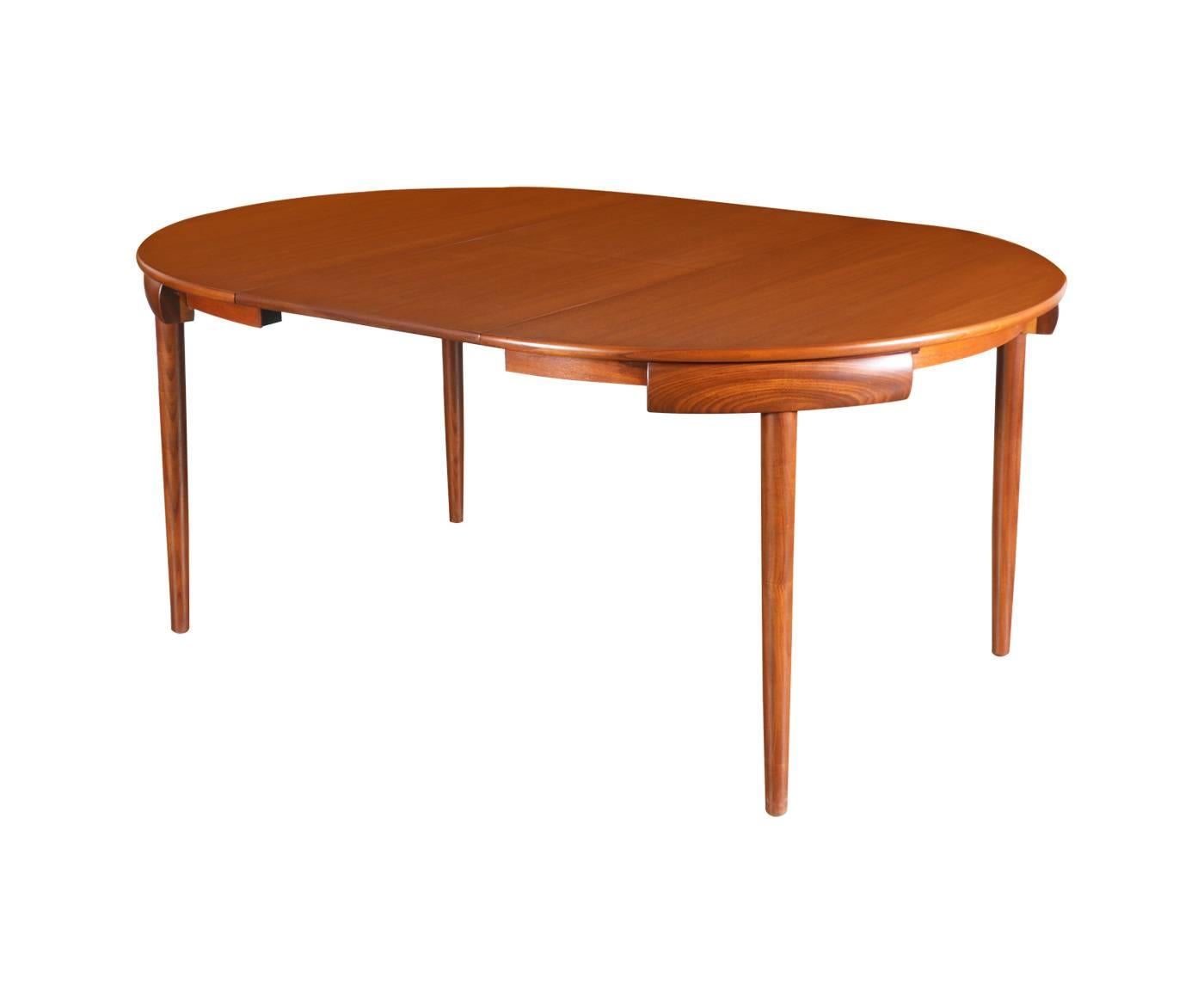 Designer: Hans Olsen
Manufacturer: Frem Røjle Møbelfabrik
Period/Style: Danish Modern
Country: Denmark
Date: 1950s

Dimensions: Table 29.25″H x 47.25″W
Extension Leaf 67.25″
Chairs 28.25″H x 18.5″W x 16″D
Seat Height 17.5″H
Materials: