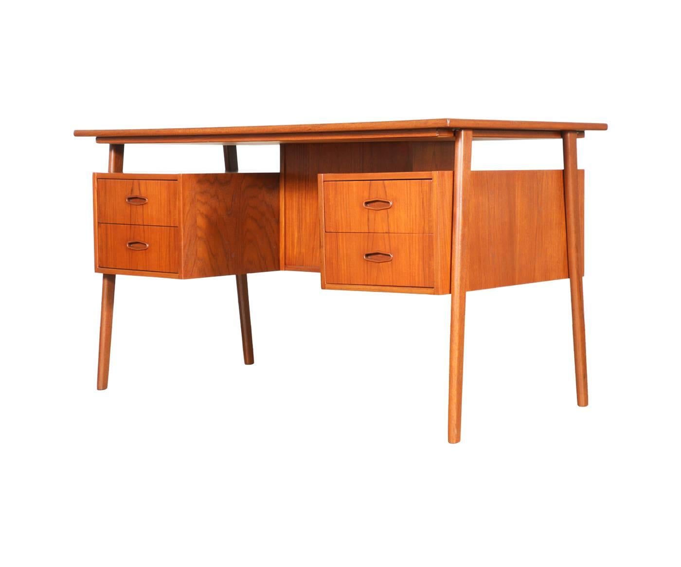 Designer: Unknown.
Manufacturer: Unknown.
Period/Style: Danish Modern.
Country: Denmark.
Date: 1960s.

Dimensions: 28.75″ H x 51″ W x 27″ D.
Materials: Teak.
Condition: Excellent, newly refinished.
Number of items: One.
ID number: 4299.