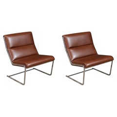 Sillas de salón cantilever de cuero coñac y acero restauradas por expertos-Poul Norreklit