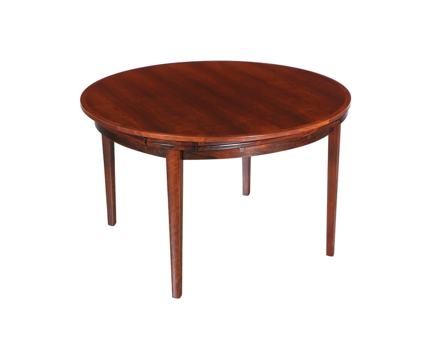 Designer: Dyrlund.
Manufacturer: Dyrlund.
Period/Style: Danish modern.
Country: Denmark.
Date: 1960s.

Dimensions: 28.75″ H x 47″ – 68.5″ diameter.
Materials: Rosewood, brass.
Condition: Excellent, newly refinished.
Number of items: