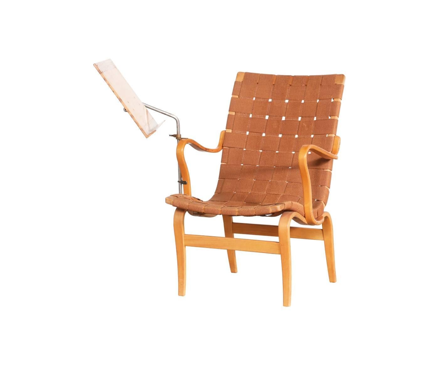 Designer: Bruno Mathsson.
Manufacturer: Karl Mathsson.
Period/Style: Swedish Modern
Country: Sweden
Date: 1936.

Dimensions: 33″ H x 23.5″ W x 27″ D,
seat height 15.5″.
Materials: Birch, beech, webbing.
Condition: As is – needs new straps
