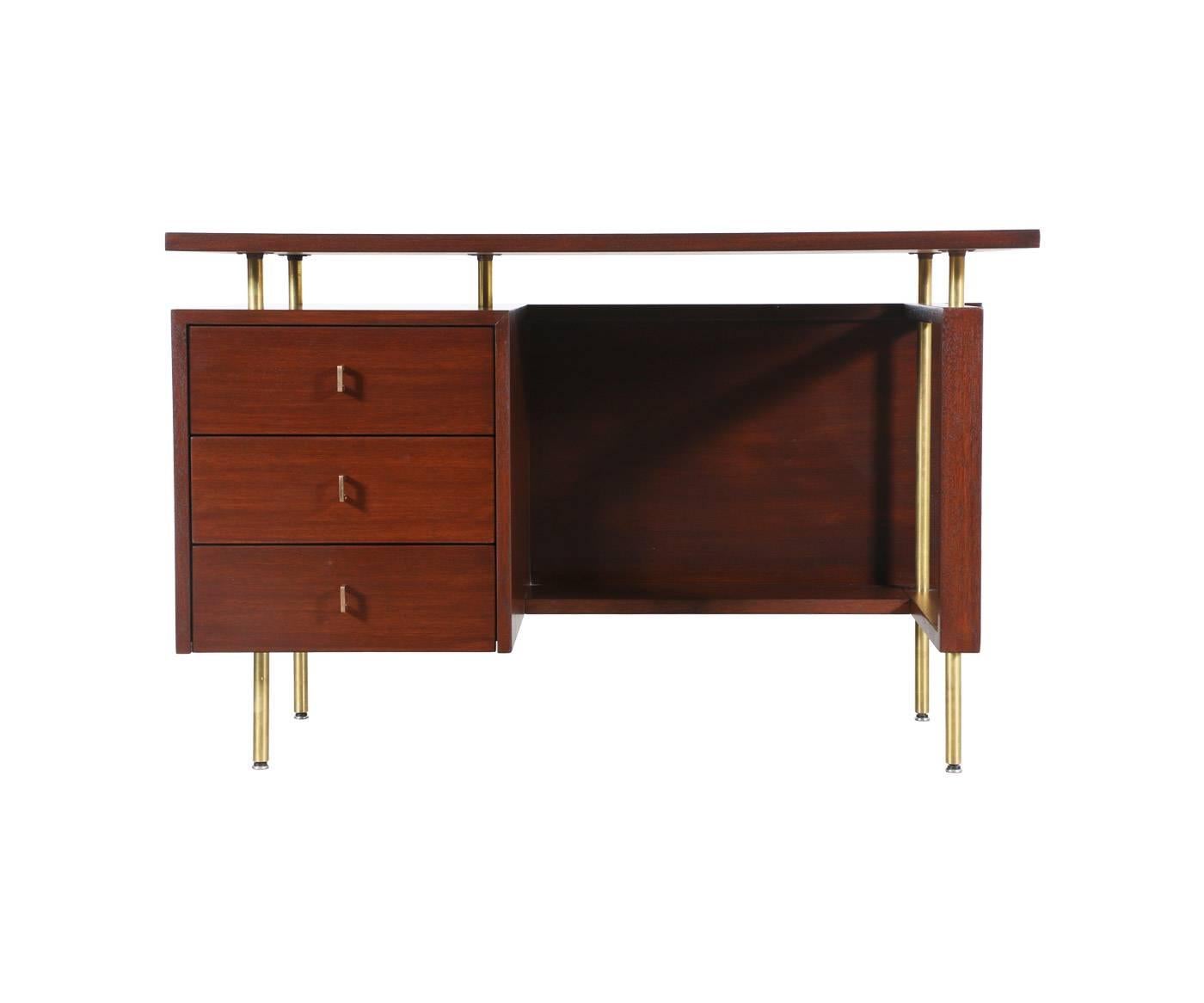 Designer: John Keal.
Manufacturer: Brown Saltman.
Period/Style: Mid-Century Modern
Country: United States.
Date: 1960s.

Dimensions: 29.5″ H x 46″ W x 23.75″ D.
Materials: Mahogany, poilished brass.
Condition: Excellent, newly