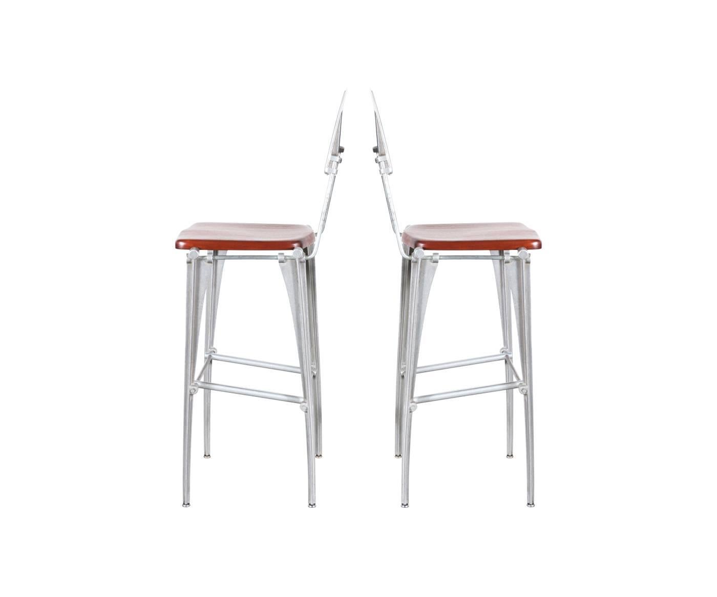 Robert Josten cast aluminum bar stools. Designer: Robert Josten.
Manufacturer: Robert Josten Studio.
Period/style: Mid-Century Modern.
Country: United States.
Date: 1970s.

Dimensions: 47.25″ H x 19″ W x 20″ D.
Seat height: