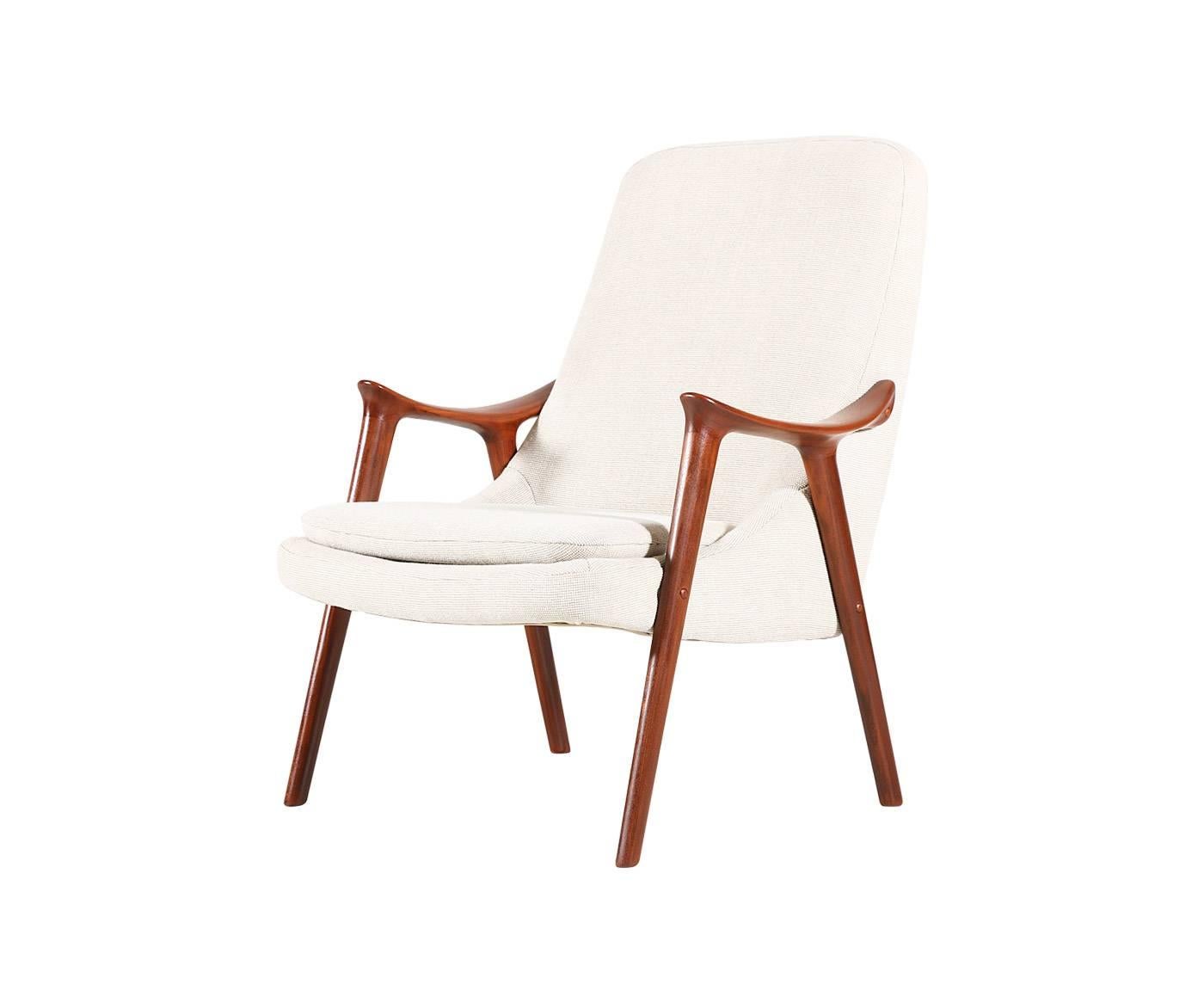 Designer: Rolf Rastad & Adolf Relling.
Manufacturer: Møre Lenestolfabrikk.
Period or style: Scandinavian Modern.
Country: Norway.
Date: 1957.

Dimensions: 35″ H x 27″ W x 30″ D,
Seat height 16.5″.
Materials: Afromosia teakwood, cotton tweed