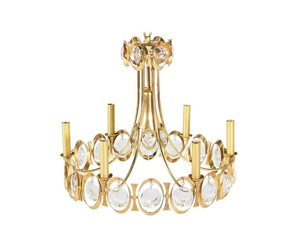 Designer: J. & L. Lobmeyr.
Manufacturer: J. & L. Lobmeyr.
Period/Style: Mid-Century Modern.
Country: Austria.
Date: 1960s.

Dimensions: 19.75″ H x 22″ W.
Materials: Brass, crystal chandelier.
Condition: Shows minor wear from age and