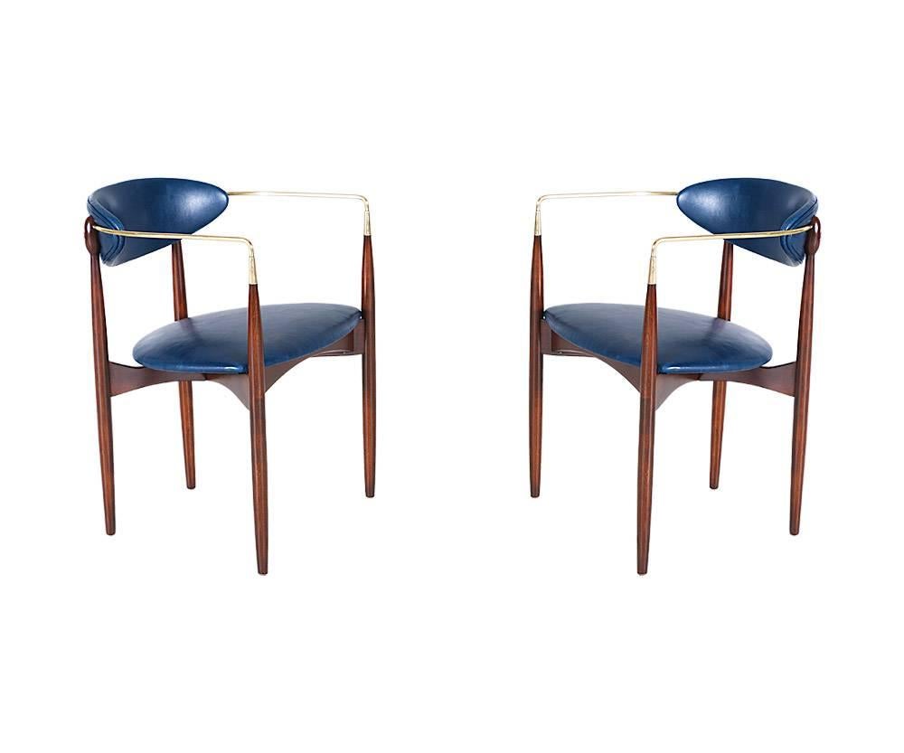 Designer: Dan Johnson
Manufacturer: Selig
Period/Style: Mid-Century Modern
Country: United States
Date: 1950s

Dimensions: 28?H x 21?W x 20?D
Seat height 17.5?
Materials: Brass, leather, walnut wood
Condition: Excellent – newly refinished