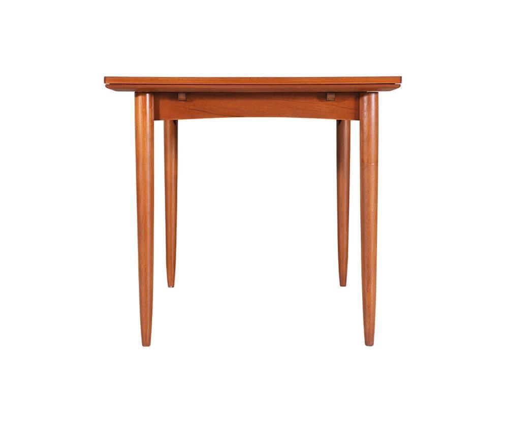 Mid-20th Century Danish Modern Expanding Draw-Leaf Dining Table