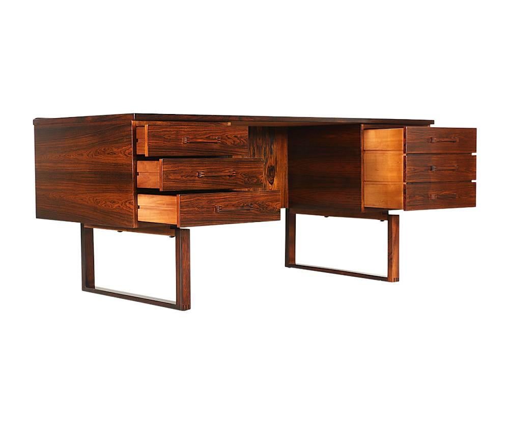 Designer: Henning Jensen & Torben Valeur
Manufacturer: Dyrlund
Period/Style: Danish modern
Country: Denmark
Date: 1960s

Dimensions: 28 H x 29.25 W x 61.25 L
Materials: Brazilian rosewood
Condition: Excellent newly refinished
Number of