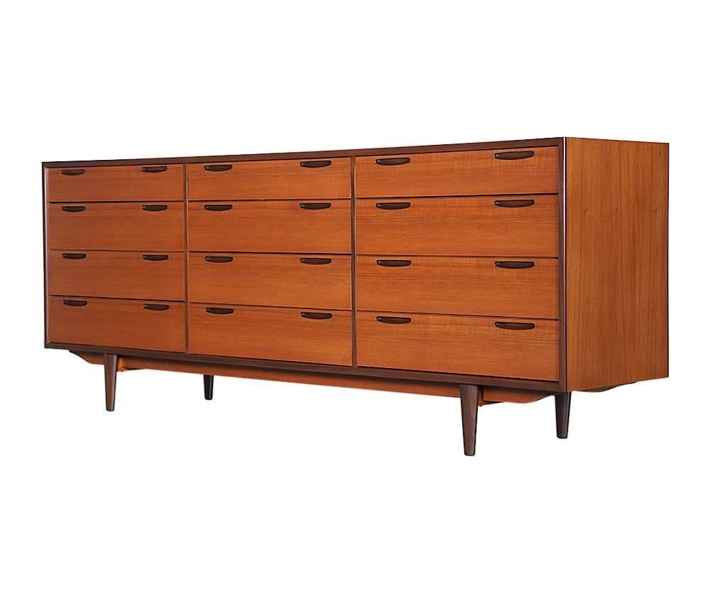 Designer: Ib Kofod-Larsen
Manufacturer: Brande Møbelfabrik
Period or style: Danish modern
Country: Denmark
Date: 1950s

Dimensions: 30.25?H x 78.75?L x 18.75?W
Materials: Teak
Condition: Excellent, newly refinished
Number of items: One
ID