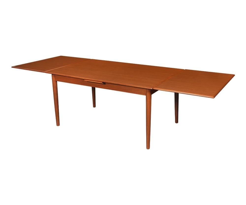 Period/style: Danish Modern
Country: Denmark
Date: 1960s

Dimensions: 29?H x 37.25?W x 57?, 104.5?L
Each ext. leaf 23.75? maximum extension 104.5?L
Materials: Teak wood
Condition: Excellent, newly refinished
Number of items: One
ID number: