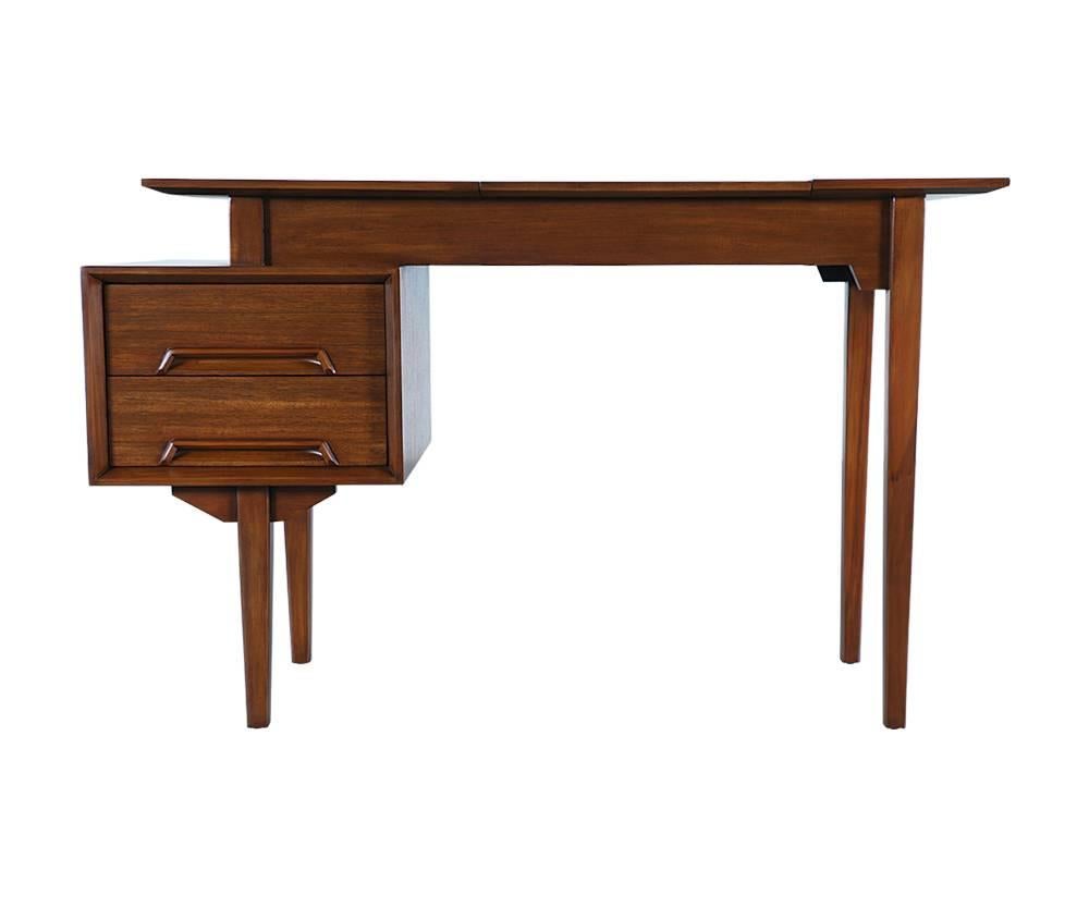 Designer: Milo Baughman
Manufacturer: Drexel “Perspective”
Period/style: Mid-Century Modern
Country: United States
Date: 1950s

Dimensions: 30?H x 48?W x 19?D
Materials: Mahogany stained walnut, original mirror
Condition: Excellent – newly