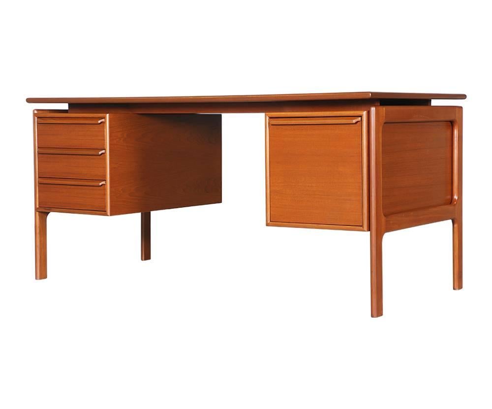 Period/Style: Danish Modern
Country: Denmark
Date: 1960s

Dimensions: 28? H x 59? W x 29.5? D
Materials: Teak wood
Condition: Excellent, newly refinished
Number of items: one
ID number: Pending.