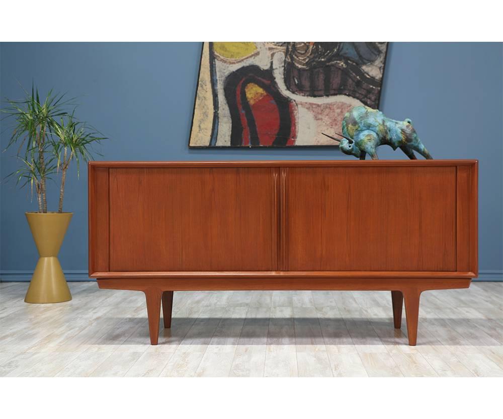 Designer: Bernhard Pedersen and Søn
Manufacturer: Bernhard Pedersen and Søn
Period/Style: Danish modern
Country: Denmark
Date: 1960s

Dimensions: 31.25?H x 65?W x 20?D
Materials: Teak wood
Condition: Excellent, newly refinished
Number of