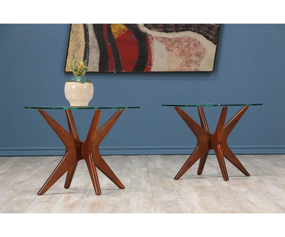 Designer: Adrian Pearsall
Manufacturer: Craft Associates
Period or style: Mid-Century Modern
Country: United States
Date: 1960s.

Dimensions: 19?H x 24?W x 20?D
Materials: Walnut wood, new glass top
Condition: Excellent, newly