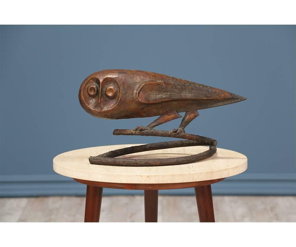 Mid-Century Modern brutalist owl sculpture designed and manufactured in the United States circa 1960’s. Adorable and uniquely crafted with bronze and copper showing minor wear and an age appropriate patina.
