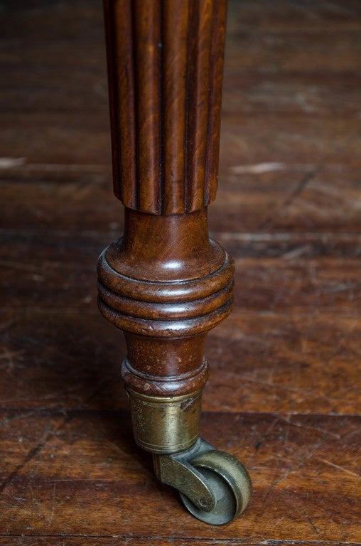 English Regency period mahogany extending dining table attributed to Gillows For Sale