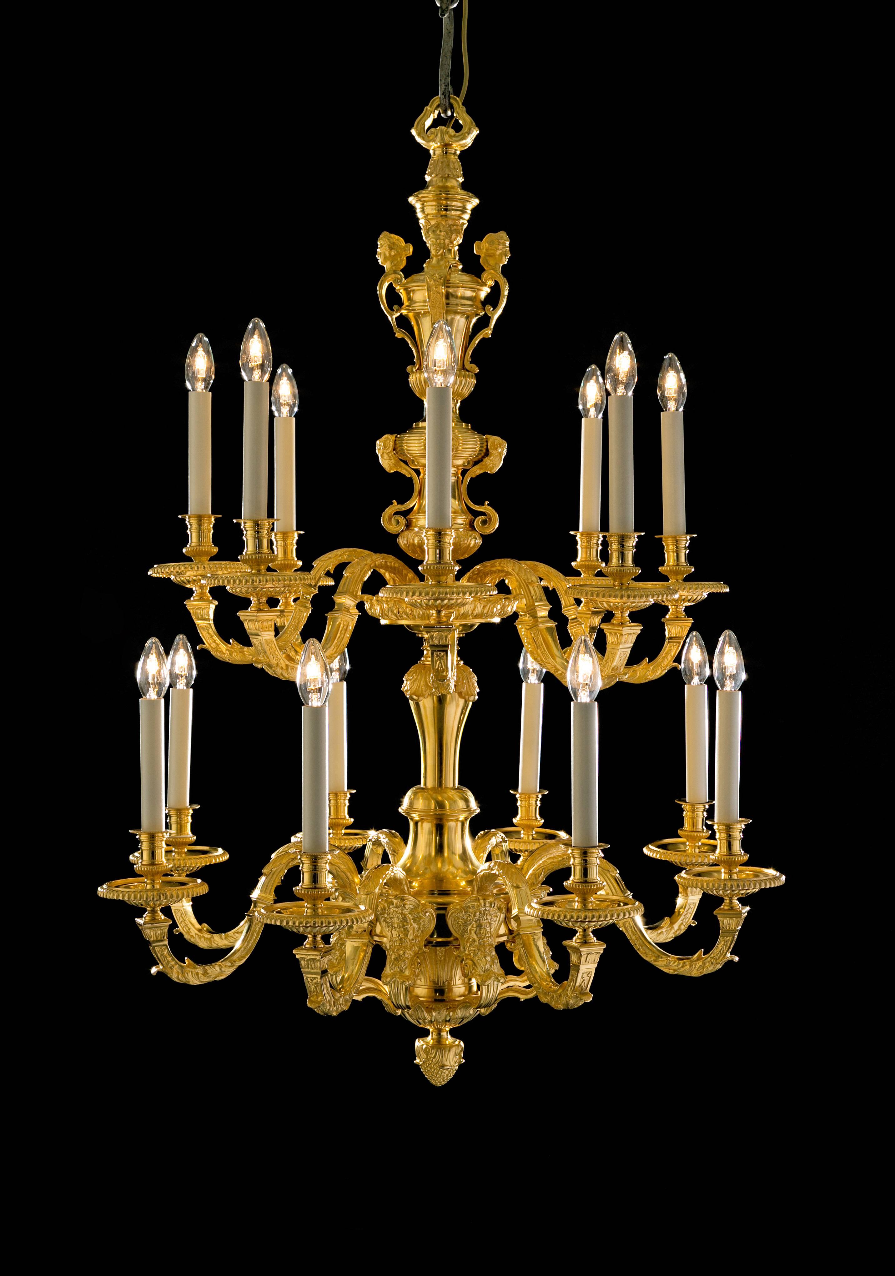 This elegant chandelier 19th century, combines several features found of examples of pieces by Andre-Charles Boulle, caryatids, rams heads and Bacchic masks.
The quality of the casting is superb.

Provenance: Reputedly from Cranbrook School,