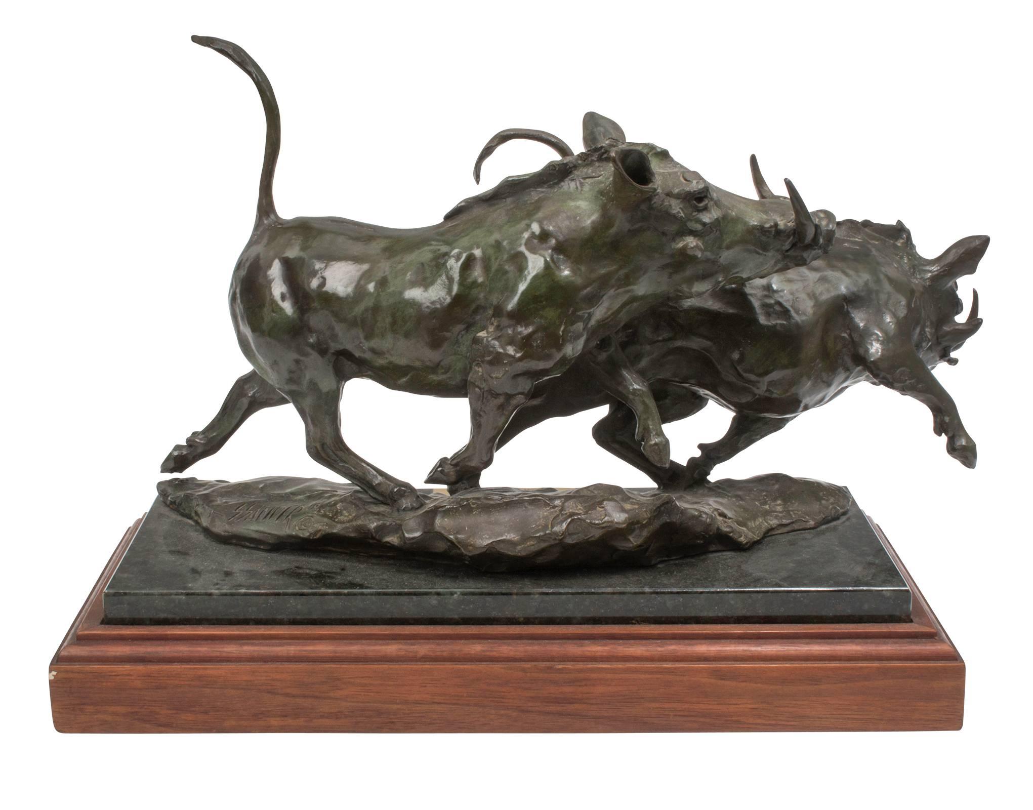 Beautifully executed bronze warthogs on wood plinth. 
Signed by Sherry Sanders.