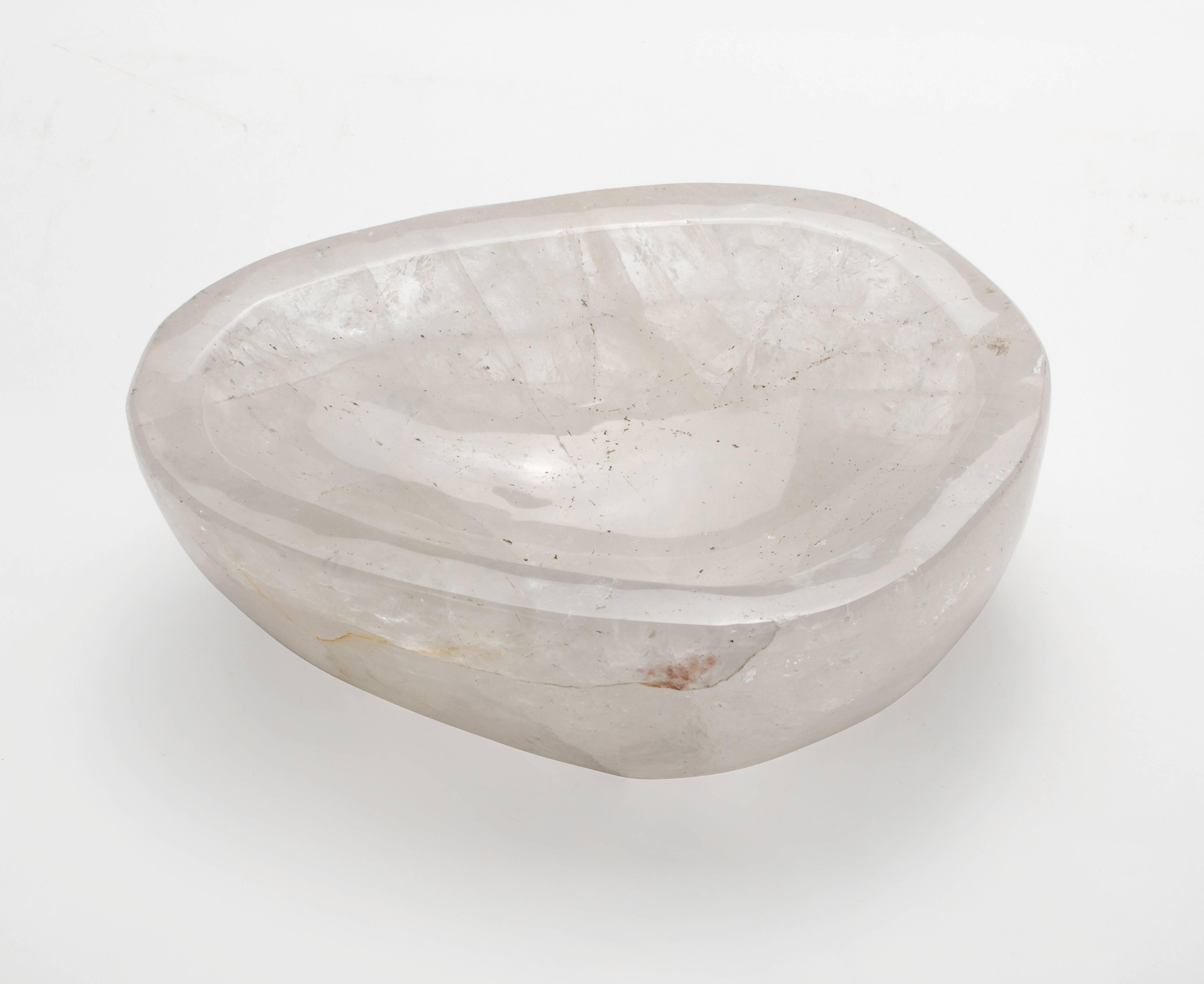 Large chunk of rock crystal specimen. Hand-carved into a beautiful natural organic shape bowl.