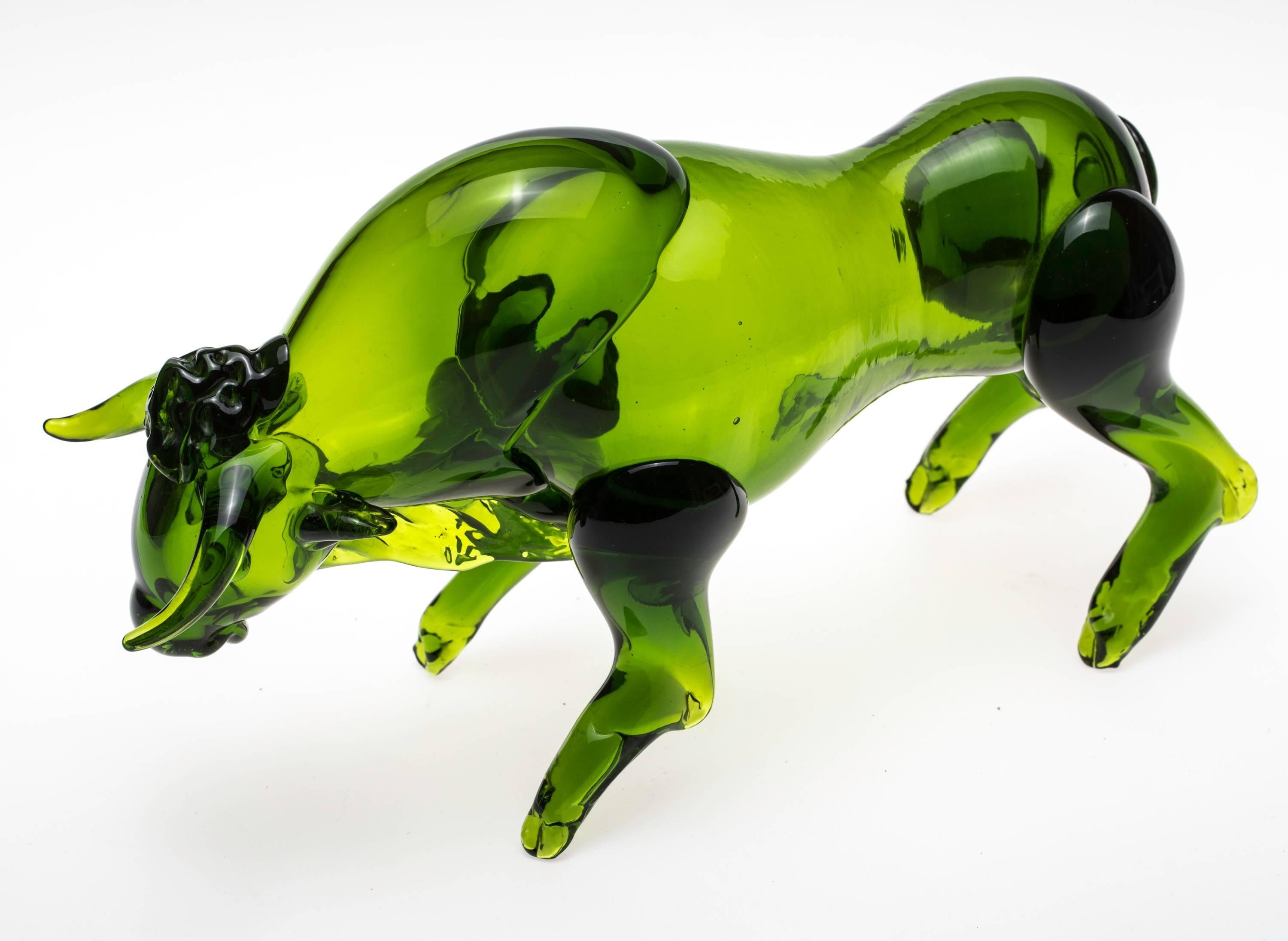 Beautifully made in Italy, Murano glass bull in true green color. Bull is standing on all four legs, head down, ready to charge. A very handsome piece!
