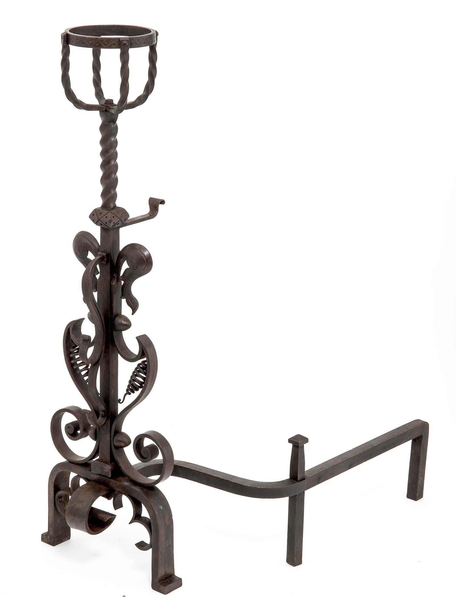 Outstanding craftsmanship on this pair of hand-wrought iron andirons.
Interestingly elegant design topped with pot holders.
In excellent condition.
 