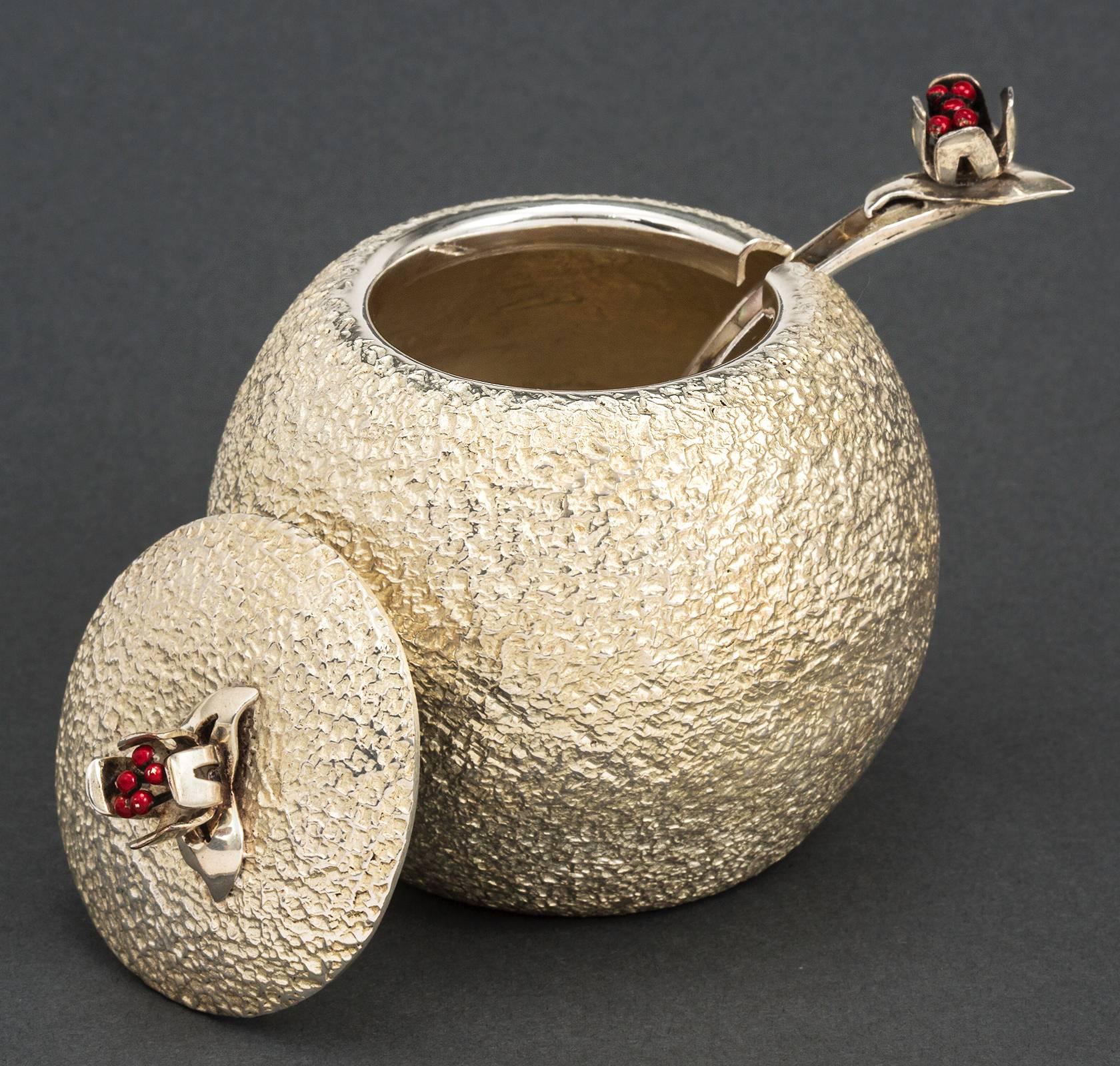 silver sugar bowl with spoon
