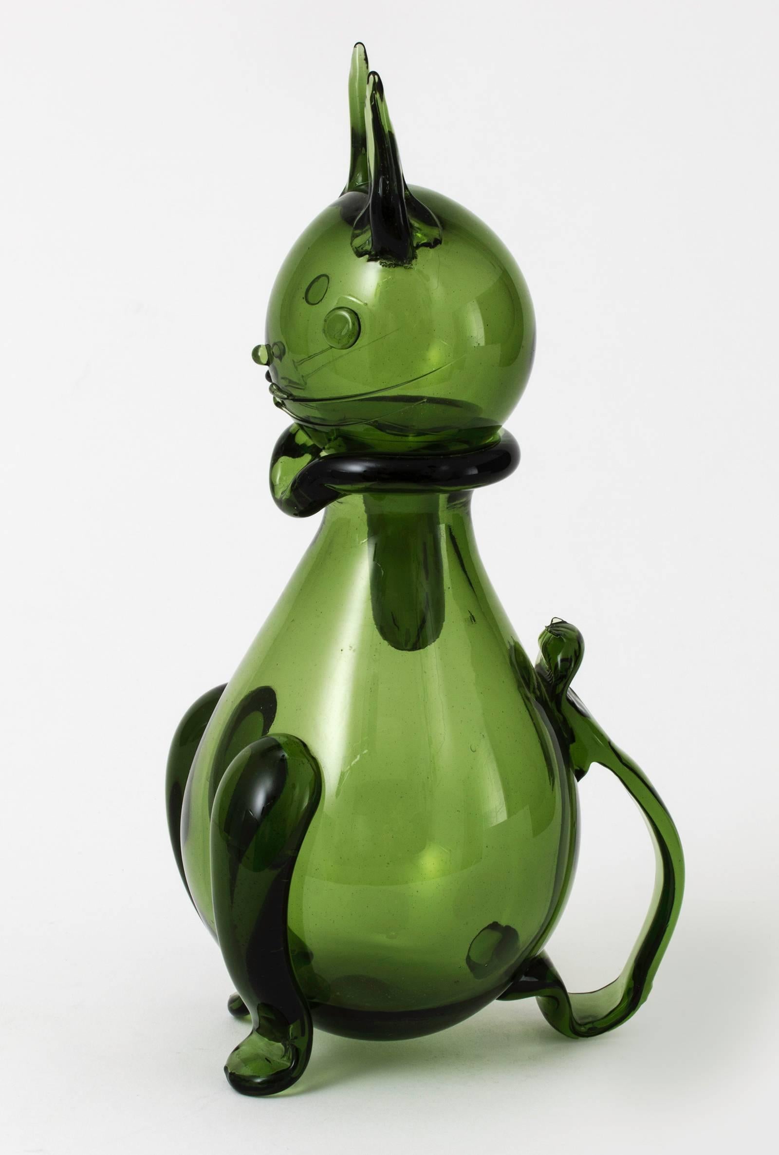 Very charming Emboli Verde handblown glass cat decanter. Beautiful green glass, whimsically stylized cat. Attributed to Gio Ponti from the 1950s.