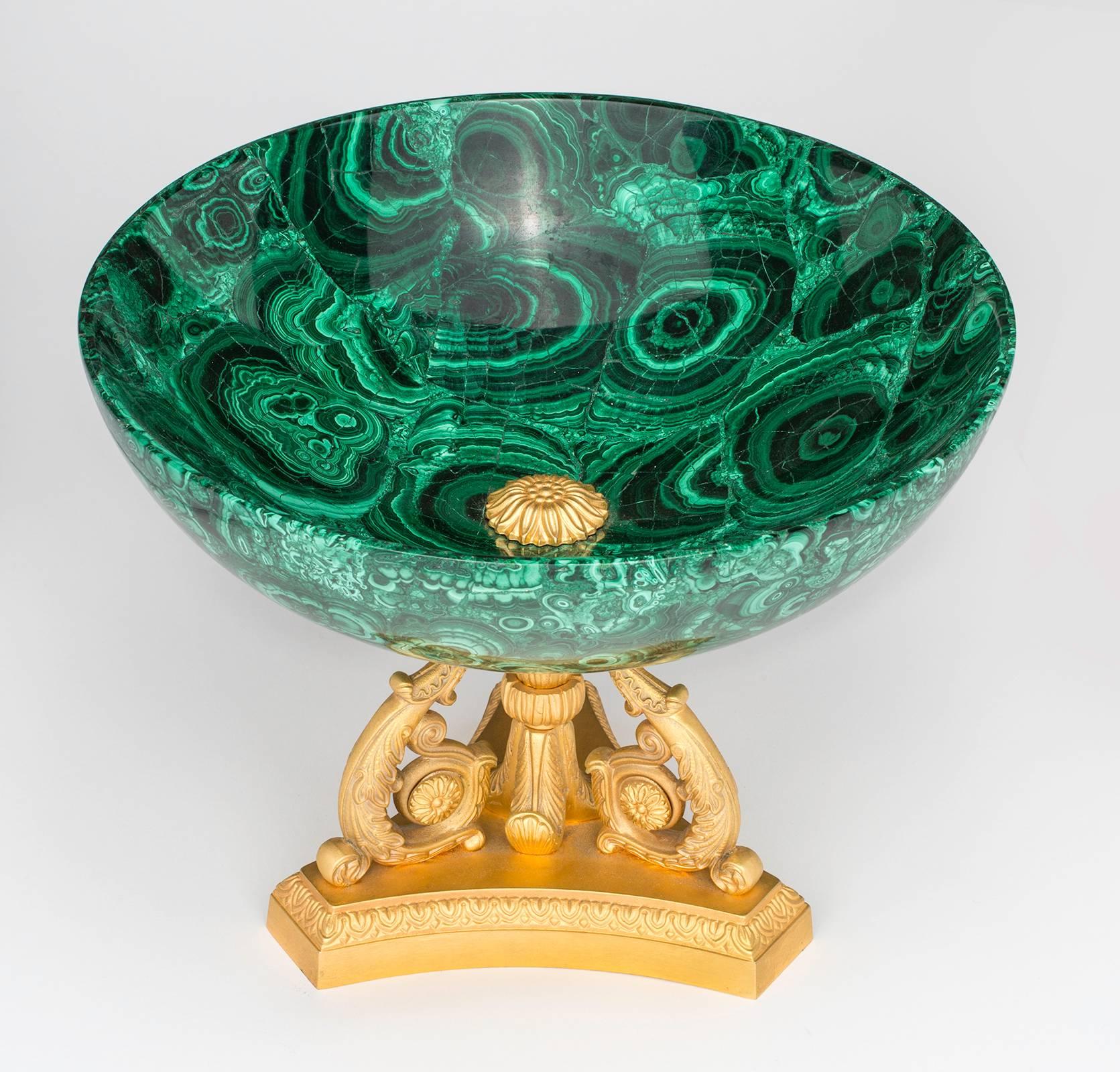 Fabulous solid Russian malachite bowl on footed triple scroll in gilt bronze doré stand. A very large dramatic piece for your table. Excellent condition.