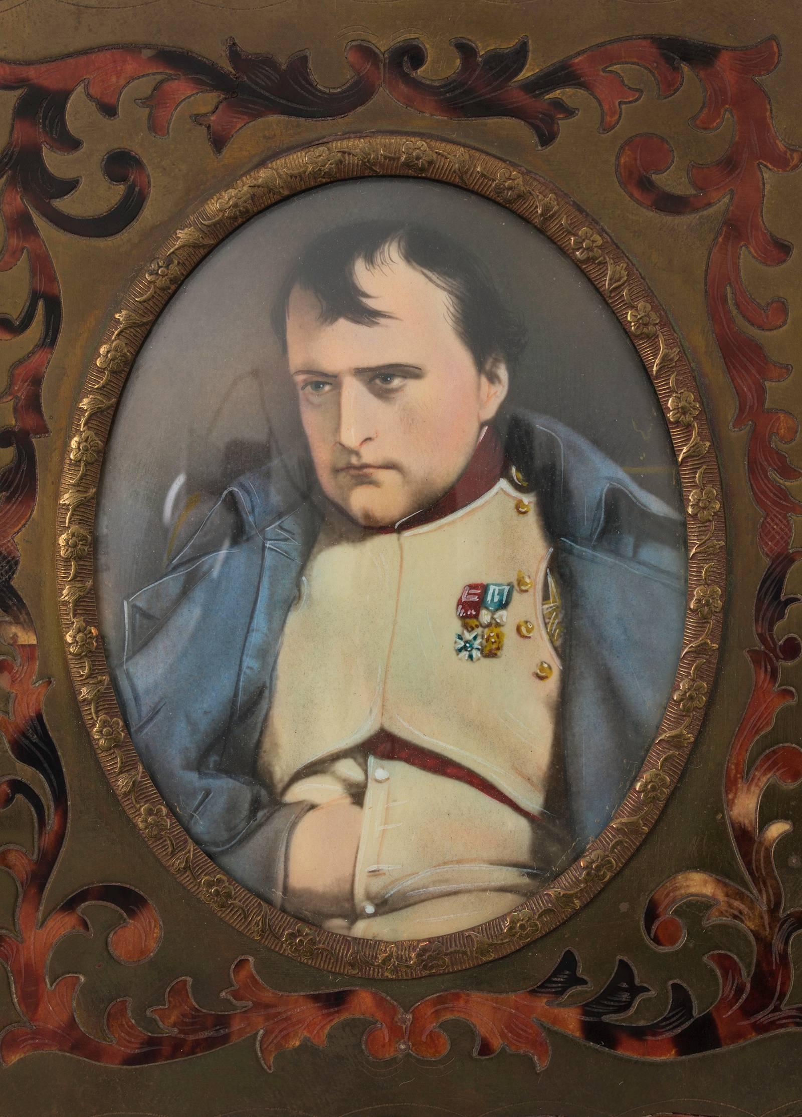 Exquisite hand-painted miniature portrait of Napoleon Bonaparte (after Paul 
Delarouche) defeated at Fountainbleau. Displayed in a fine boulle marquetry frame. Makes an impressive addition to any collection.