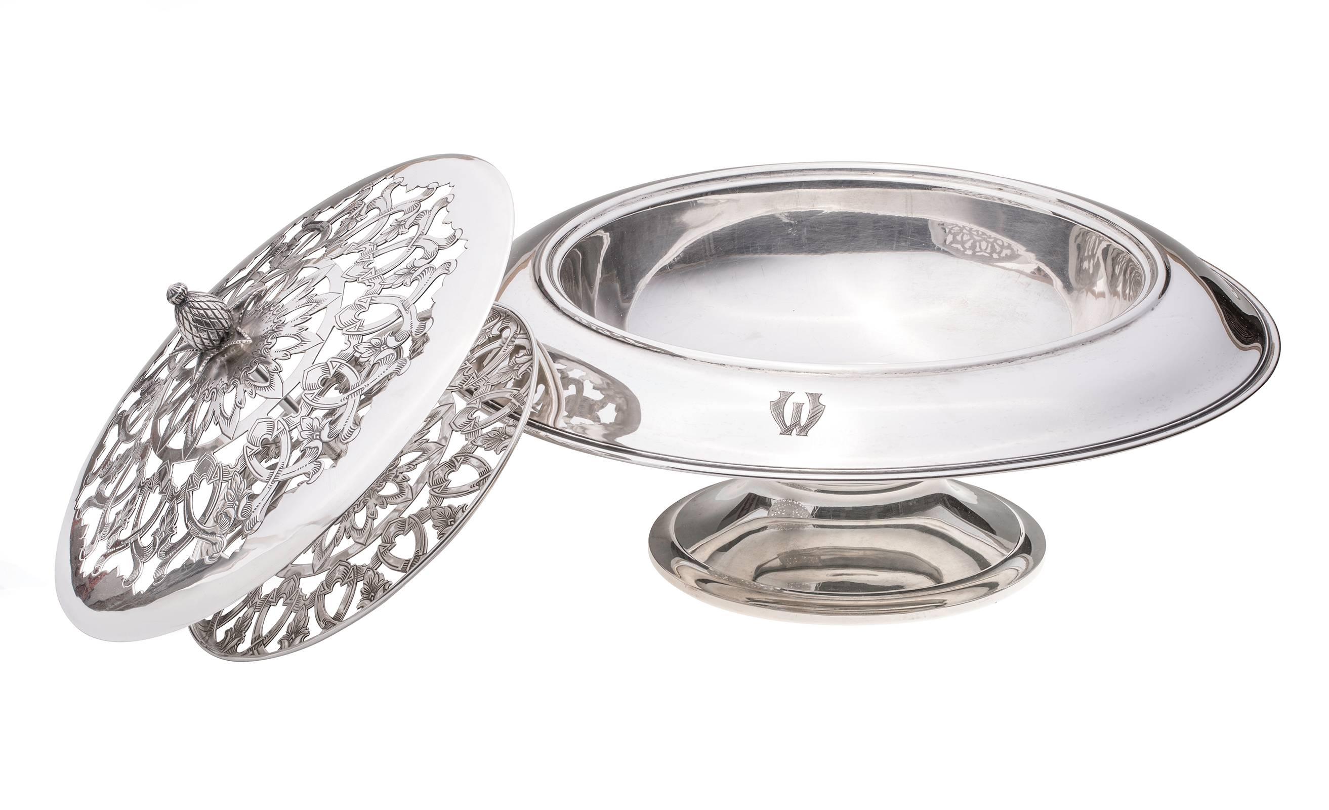Shreve Treat & Eacret sterling silver flower frog bowl. Double lid is pierced in floral design for placing cut flowers.
Pineapple center knob for easy lid removal.
Very beautiful decorative centerpiece for your table. Monogrammed 'M or 'W' on the
