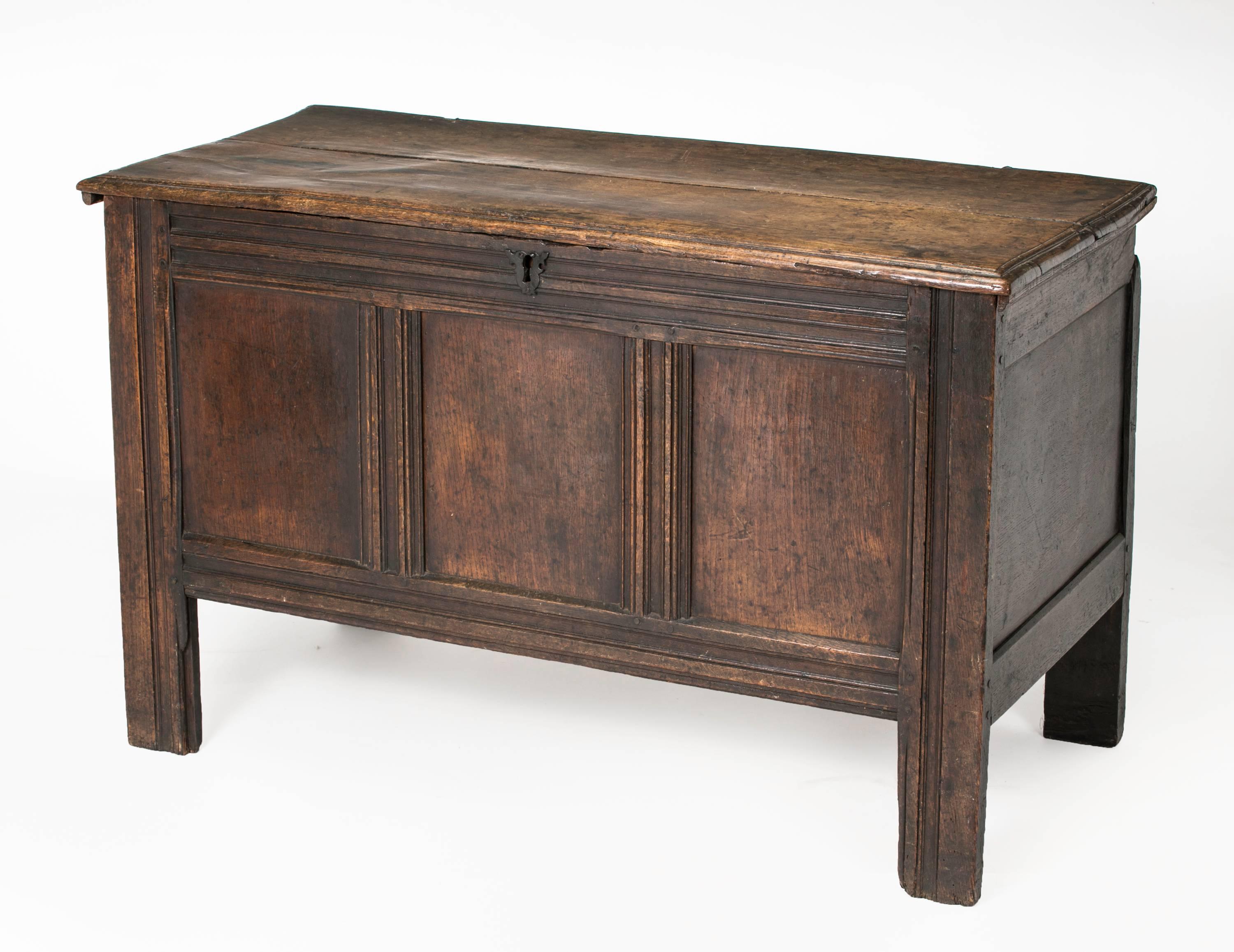 Early 19th century English walnut coffer trunk. Hinged lid for blanket storage and side interior attached box for candles or small items. Wonderfully aged patina wood, simple straight panels and legs. Wonderful storage table.